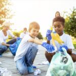 young community champion award - picture of young children picking up litter